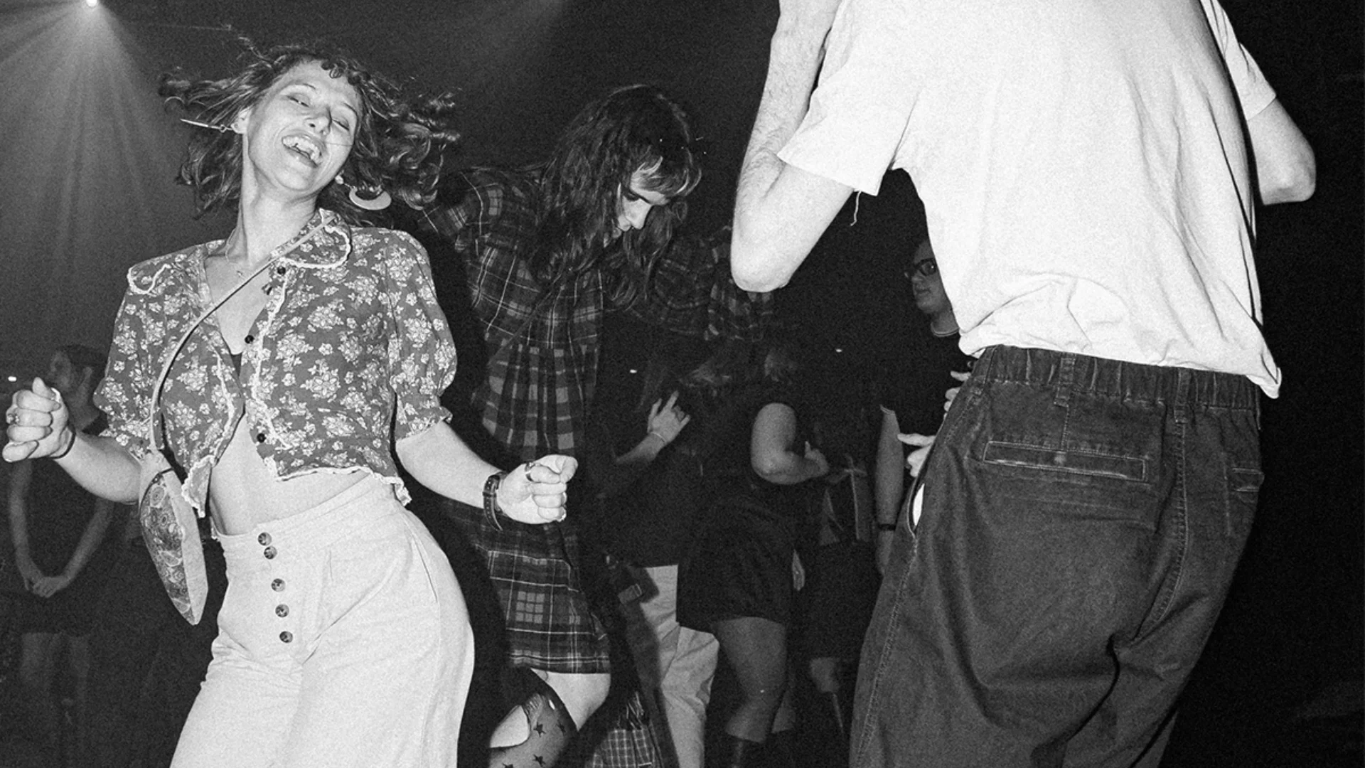 Black and white image of two people dancing
