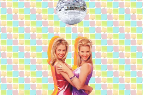 A poster for the film Romy and Michelle's High School Reunion. Two blonde women wearing colourful dresses hug each other and smile at the camera. A disco ball hangs above them.